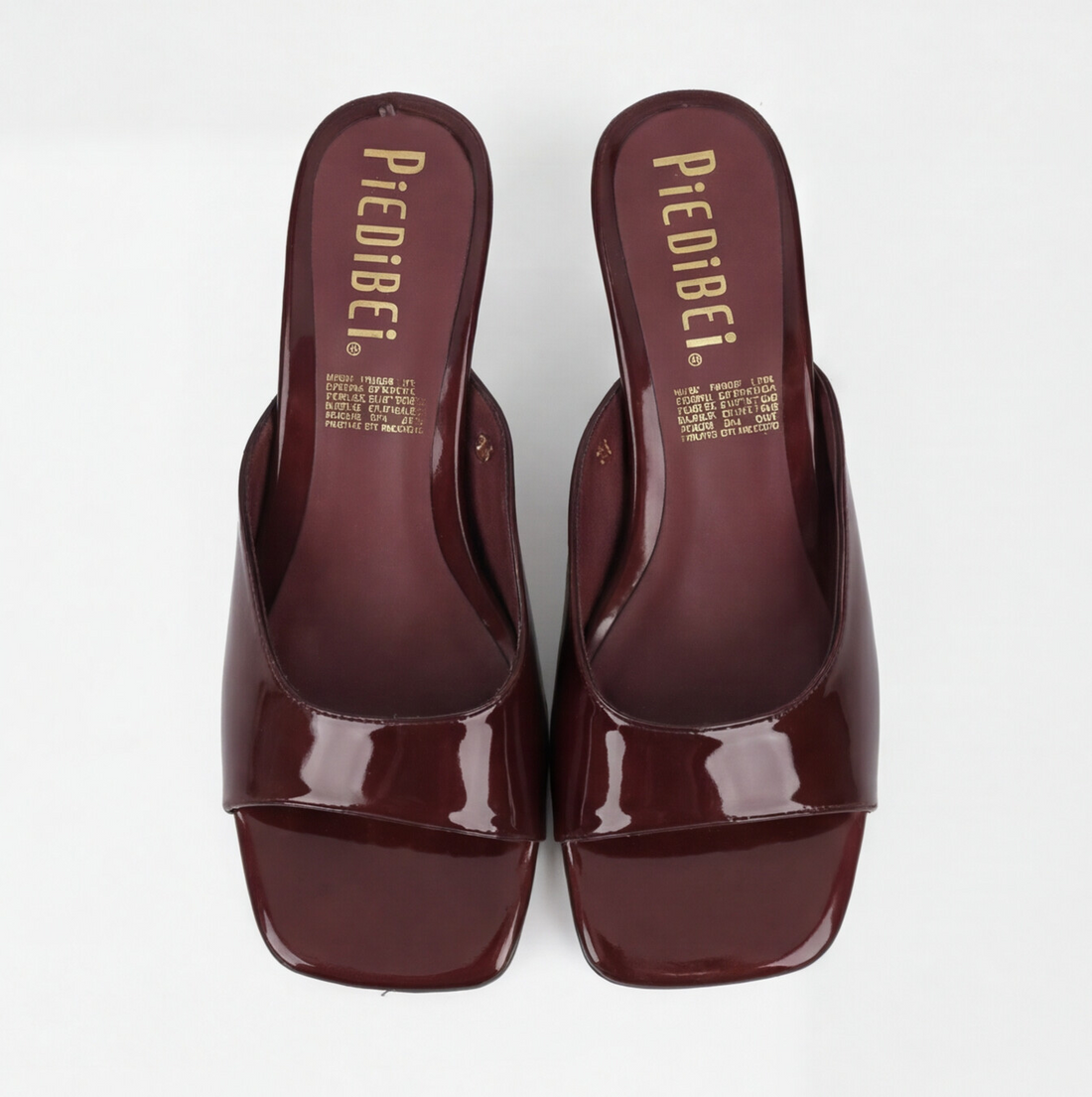 Sandalia mule de tacón charol merlot