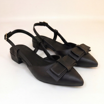 Sandalia plana color negro con tiras y detalle de moño Piedibei