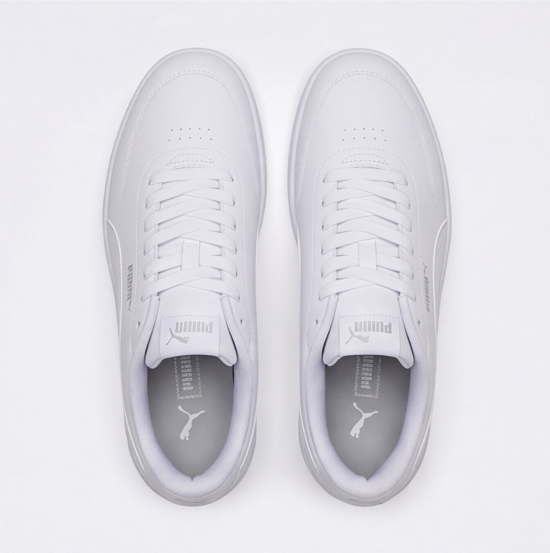 Tenis Puma Court Classic Clean blancos monocromáticos
