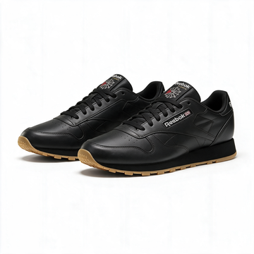 Tenis Reebok Classic Leather negros con suela gum
