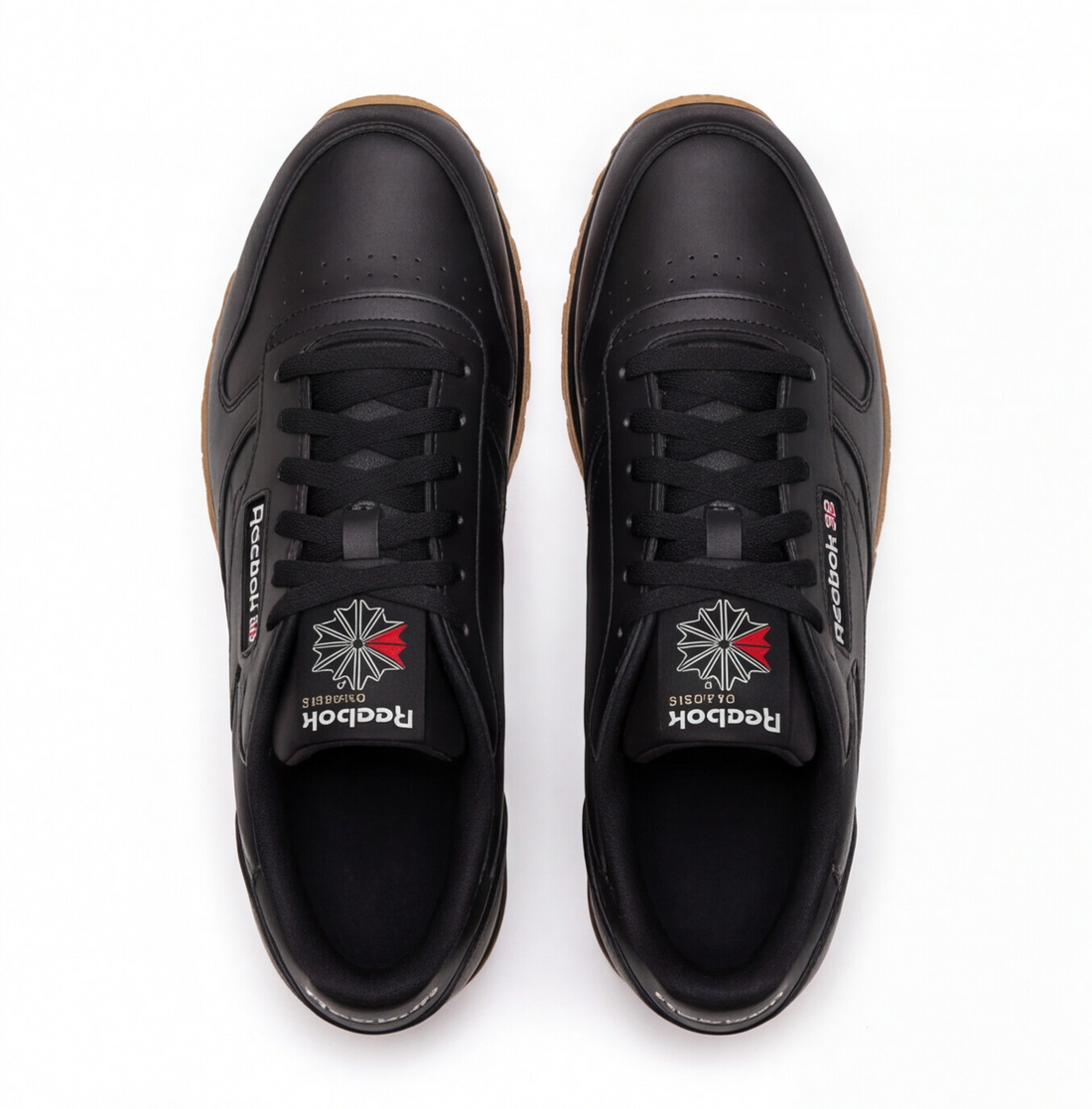 Tenis Reebok Classic Leather negros con suela gum